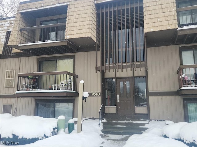 view of snow covered building