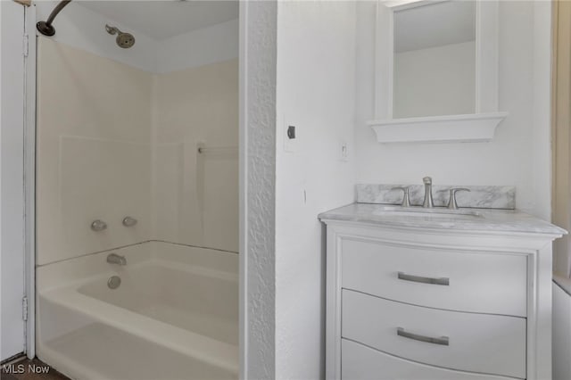 full bathroom featuring vanity and shower / bathtub combination