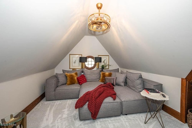 interior space featuring vaulted ceiling, baseboards, and an inviting chandelier