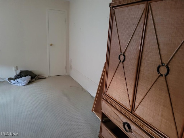 unfurnished bedroom with carpet flooring