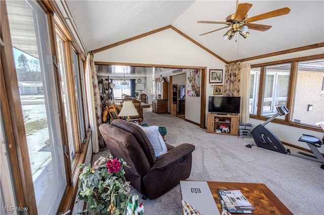 living area featuring light carpet, lofted ceiling, a ceiling fan, and baseboards