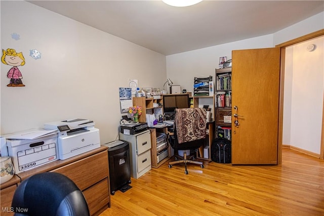 office with light wood-style floors