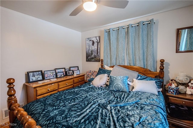 bedroom with visible vents and ceiling fan