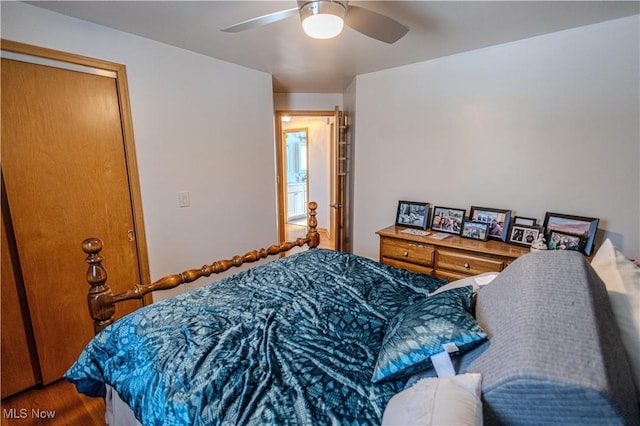 bedroom featuring a ceiling fan and wood finished floors