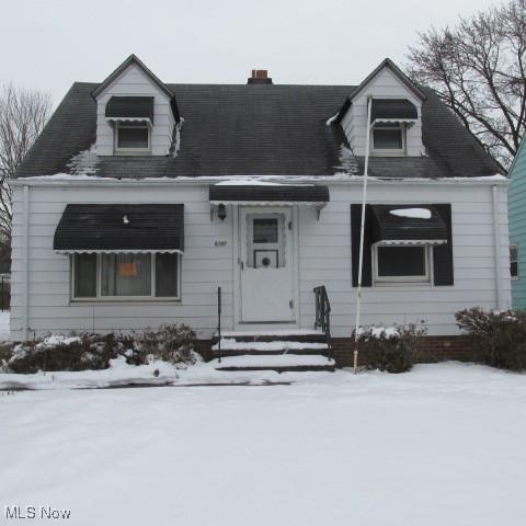 cape cod house with entry steps