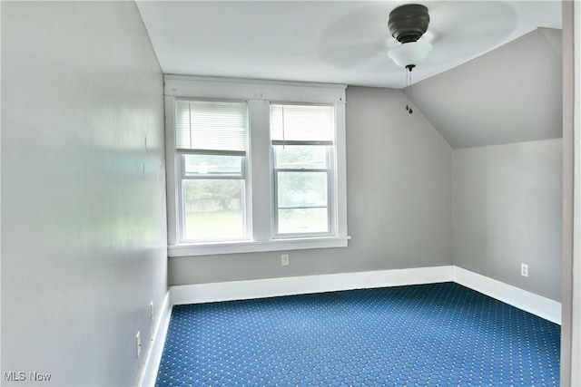 bonus room featuring carpet, baseboards, vaulted ceiling, and a ceiling fan