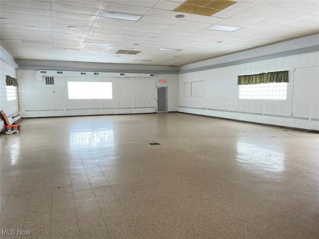 parking garage with a baseboard heating unit