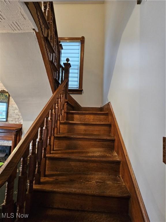 staircase with a healthy amount of sunlight