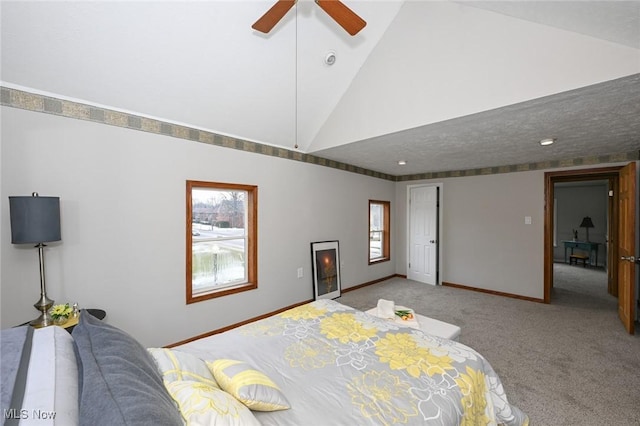 bedroom featuring a closet, a ceiling fan, light carpet, high vaulted ceiling, and baseboards