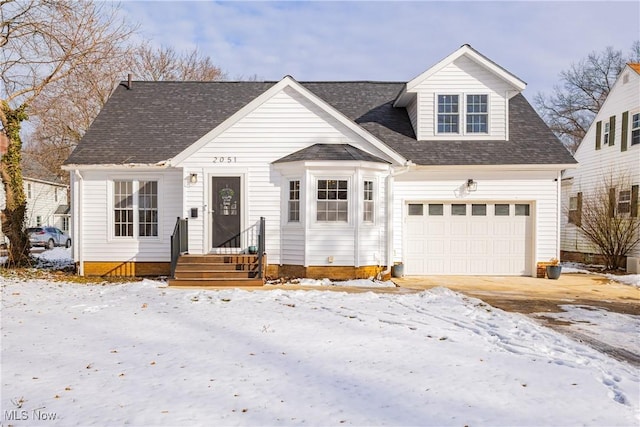 view of front of property with roof with shingles