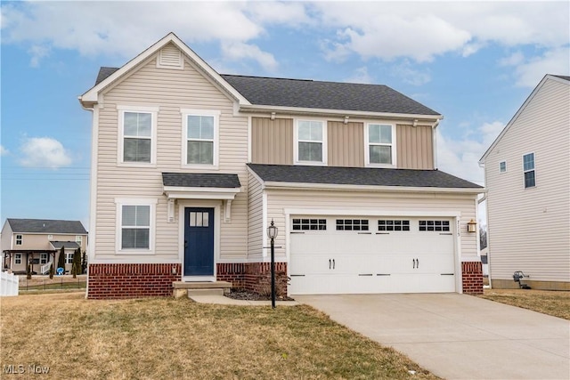 view of front of home featuring brick siding, concrete driveway, board and batten siding, a front yard, and a garage