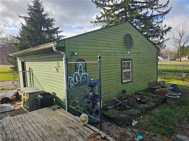 view of outdoor structure featuring fence