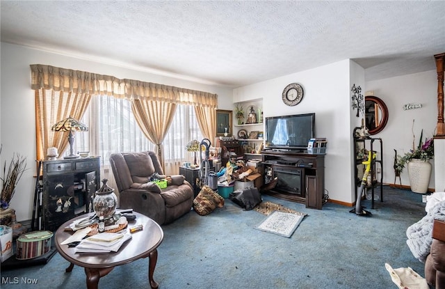 living area featuring a textured ceiling, carpet, a fireplace, and baseboards