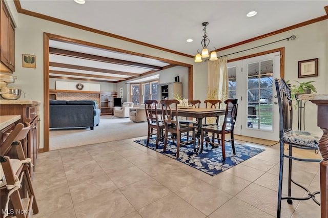 dining room with light carpet, light tile patterned floors, recessed lighting, and crown molding