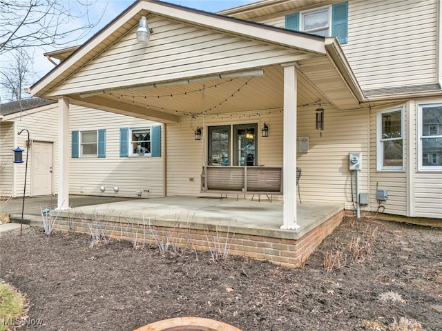 back of house featuring a patio