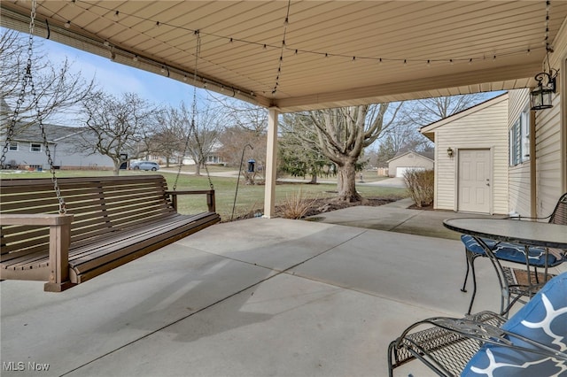 view of patio with outdoor dining area