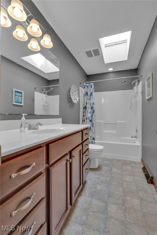 full bathroom with toilet, shower / bath combo, a skylight, and visible vents