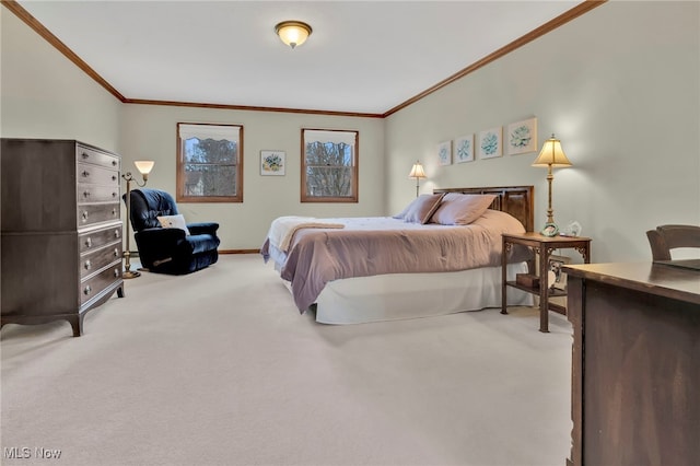 bedroom with ornamental molding, light colored carpet, and baseboards