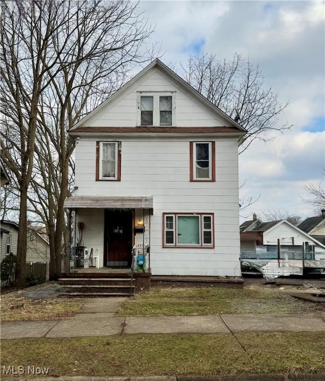 traditional style home featuring a porch