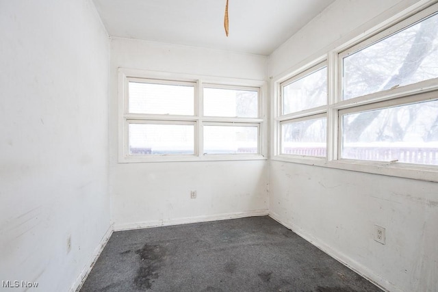 empty room with baseboards