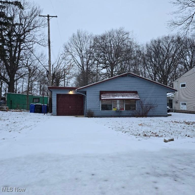 view of front facade with an attached garage