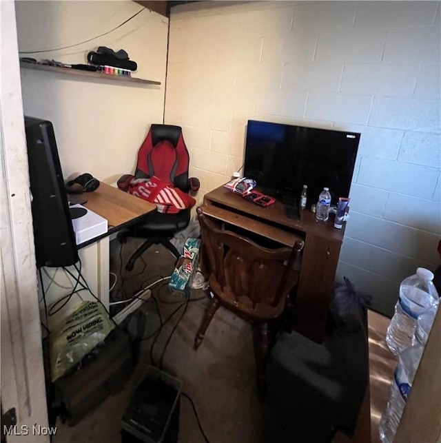 office featuring concrete block wall