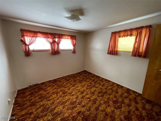 view of carpeted spare room