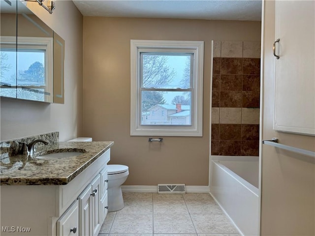 full bath featuring visible vents, toilet, vanity, tile patterned flooring, and baseboards