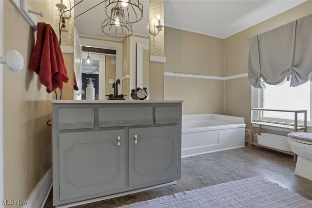 1304 Foster Ave, Cambridge, OH 43725 - full bath with toilet, a bath, and vanity