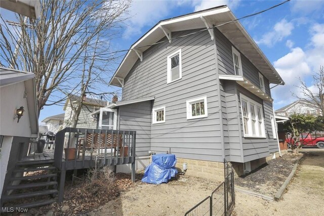 1304 Foster Ave, Cambridge, OH 43725 - view of side of property featuring a deck