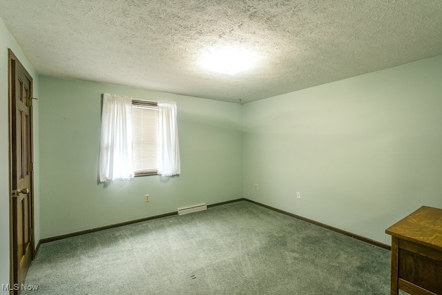 unfurnished bedroom with a textured ceiling, carpet floors, visible vents, and baseboards