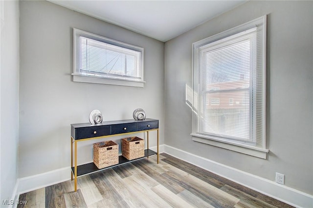 interior space with light wood-style flooring and baseboards