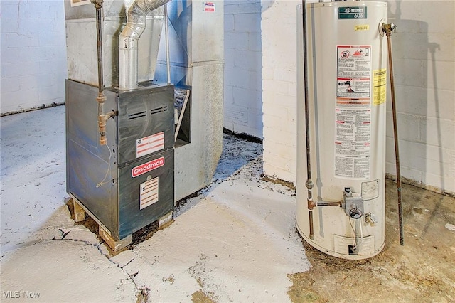 utility room featuring gas water heater and heating unit