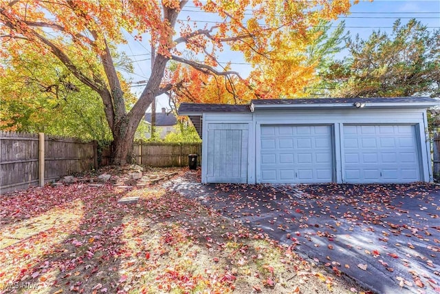 detached garage with fence