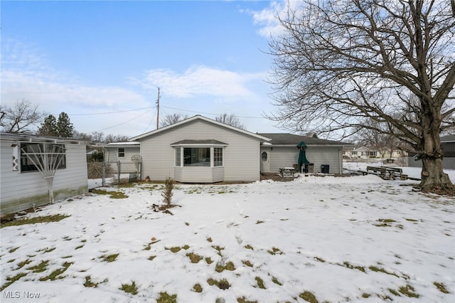 view of snow covered property