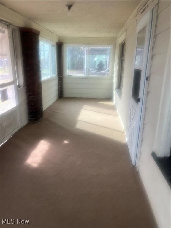 view of unfurnished sunroom