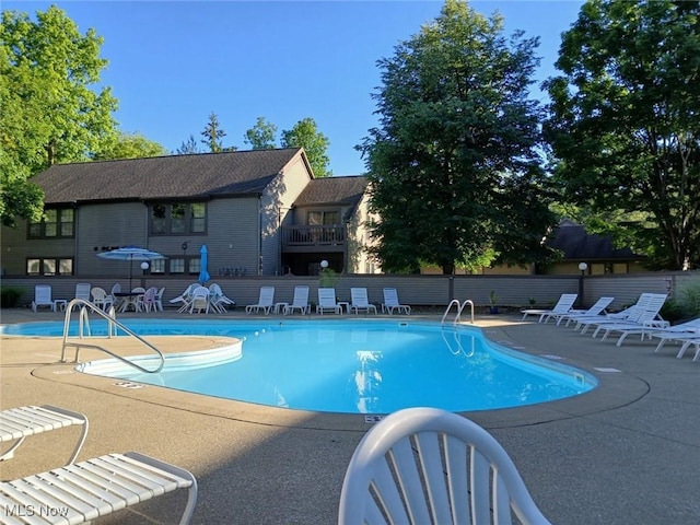 community pool featuring a patio