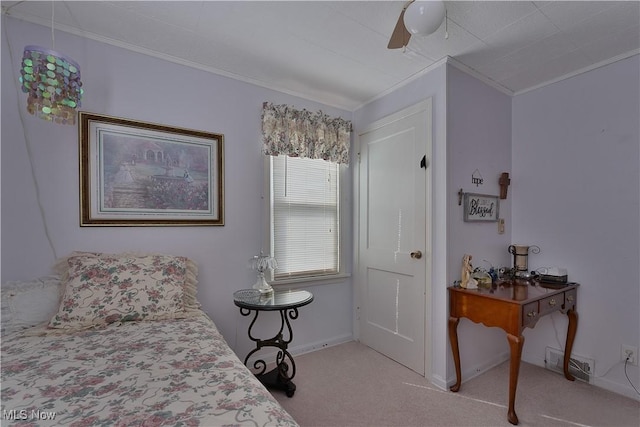 bedroom with visible vents, a ceiling fan, light colored carpet, and crown molding