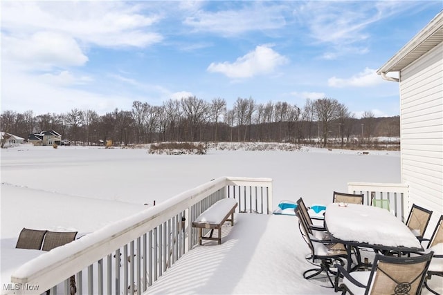 view of snow covered deck