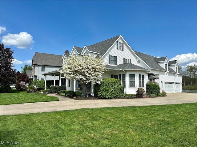 view of front of house featuring a front yard and driveway