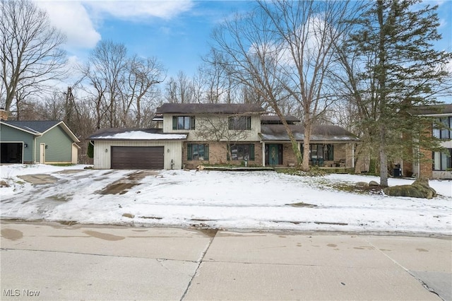 prairie-style home featuring an attached garage