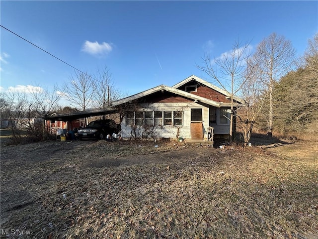 view of front facade with an attached carport