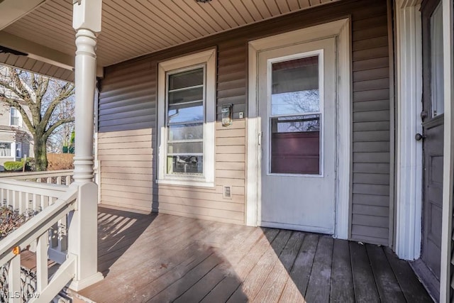 wooden terrace featuring a porch