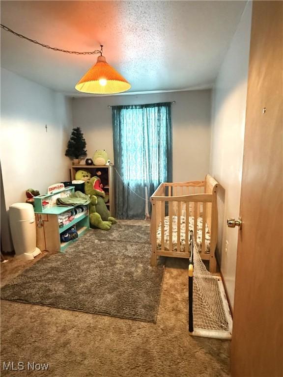 bedroom featuring carpet flooring