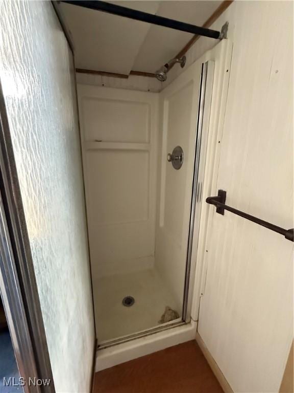 full bathroom with a stall shower