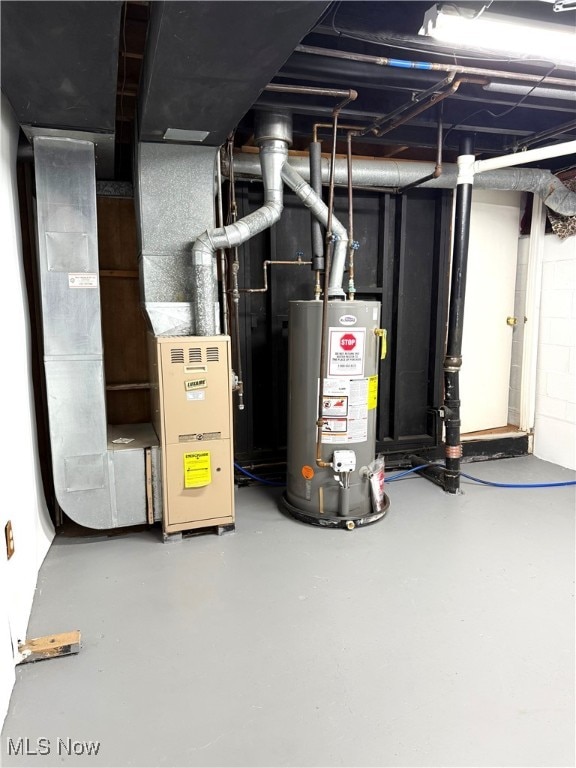 utility room with water heater