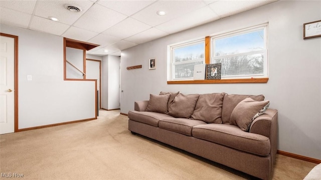 living area with baseboards, visible vents, light colored carpet, a paneled ceiling, and recessed lighting