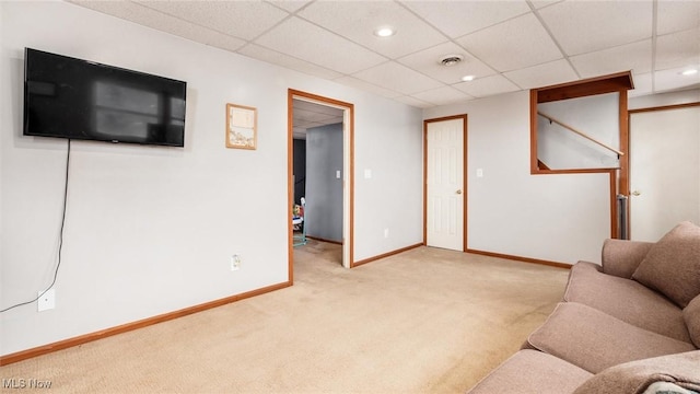 living area featuring light carpet, visible vents, baseboards, and recessed lighting