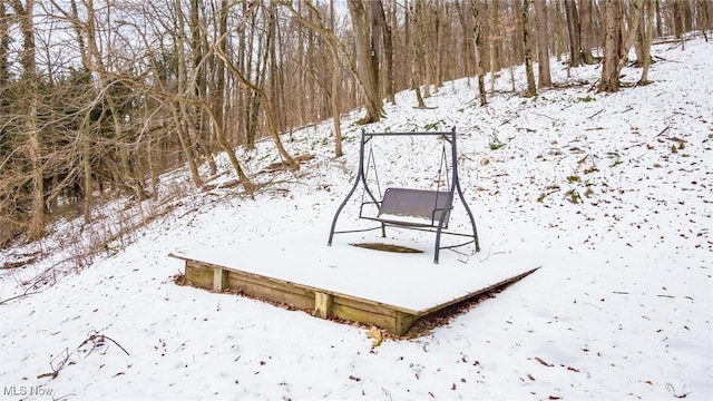 view of yard layered in snow