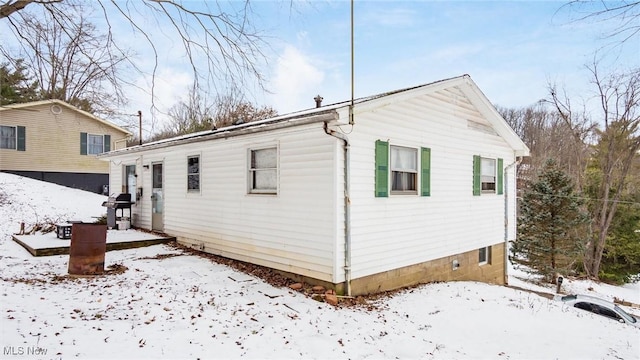 view of snow covered property